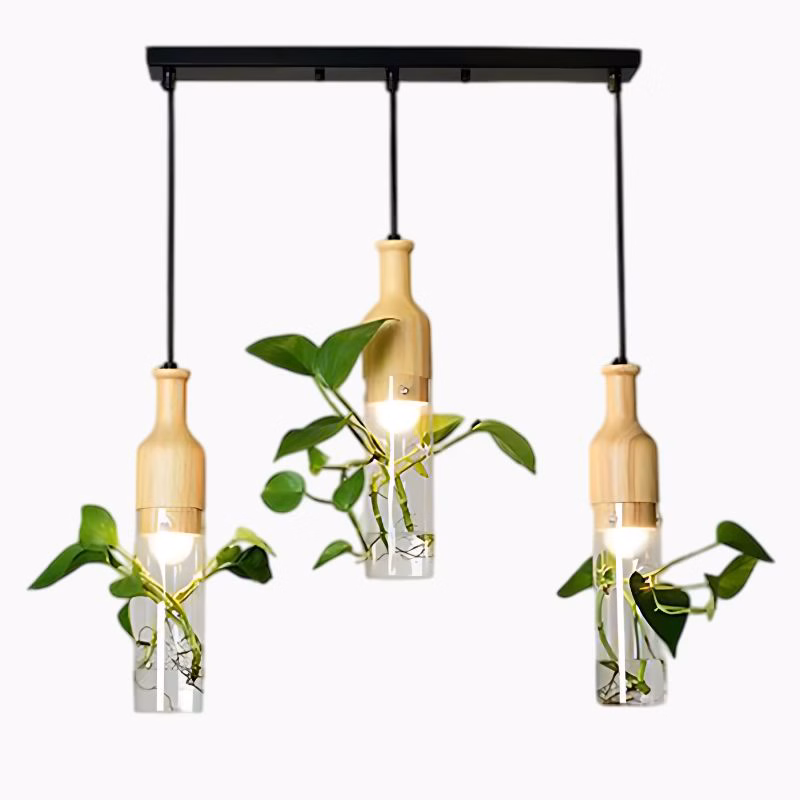 Suspension design triple avec bouteilles de verre illuminées