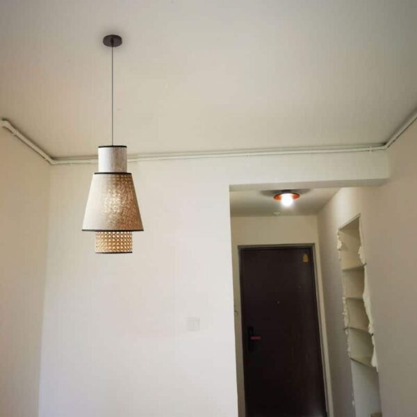 Suspension nordique en rotin naturel avec alliance de tissu